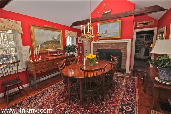 Dining Room w/Fireplace & windows to gardens