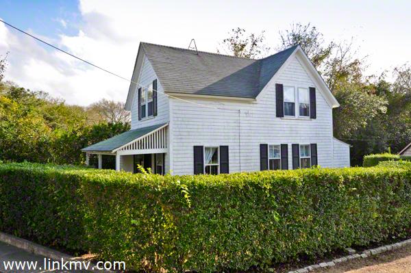 Farmhouse Is Surrounded By Privet Hedge