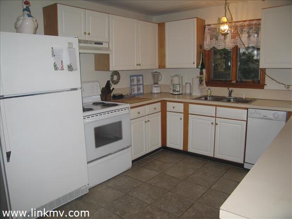Kitchen with new tile floor