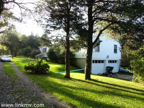 Two car garage under 3 bedroom house!