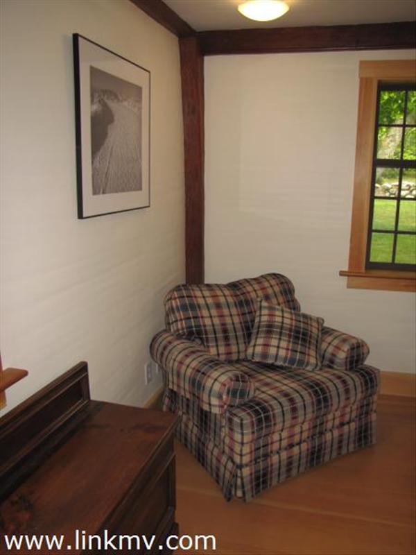Note seeded windows, original beams, and lath and plaster walls