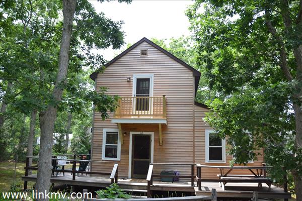 Comfy cottage with new siding on front