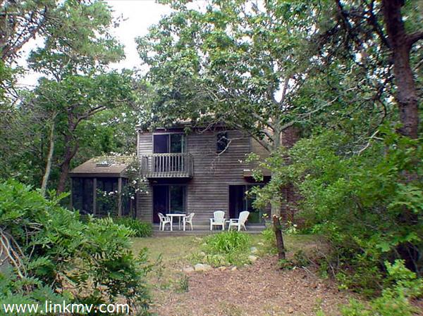 Deck side shows screen porch on left.