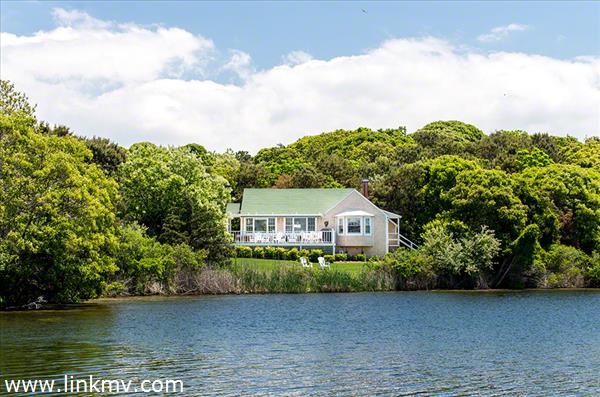 Mermaid Boathouse Sits On The Shoreline Of Crystal Lake