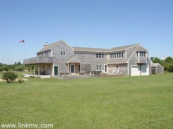 Right side of house showing deck and garage