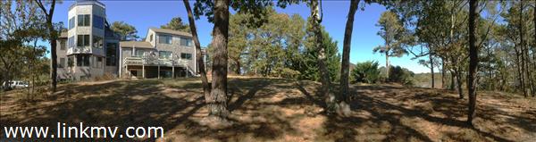 House abuts Greenbelt for additional privacy.