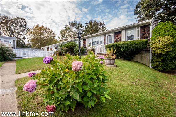 Front entrance to your end unit condo with dedicated parking spot out front and pool just steps away!