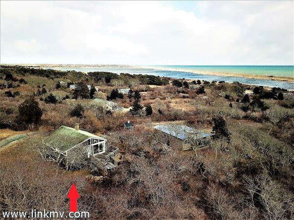 aerial view looking over Chilmark Pond to the Atlantic Ocean
